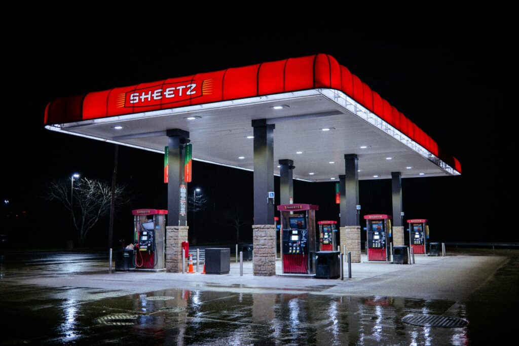 Gas pumps at a Sheetz gas station in Pennsylvania at night.